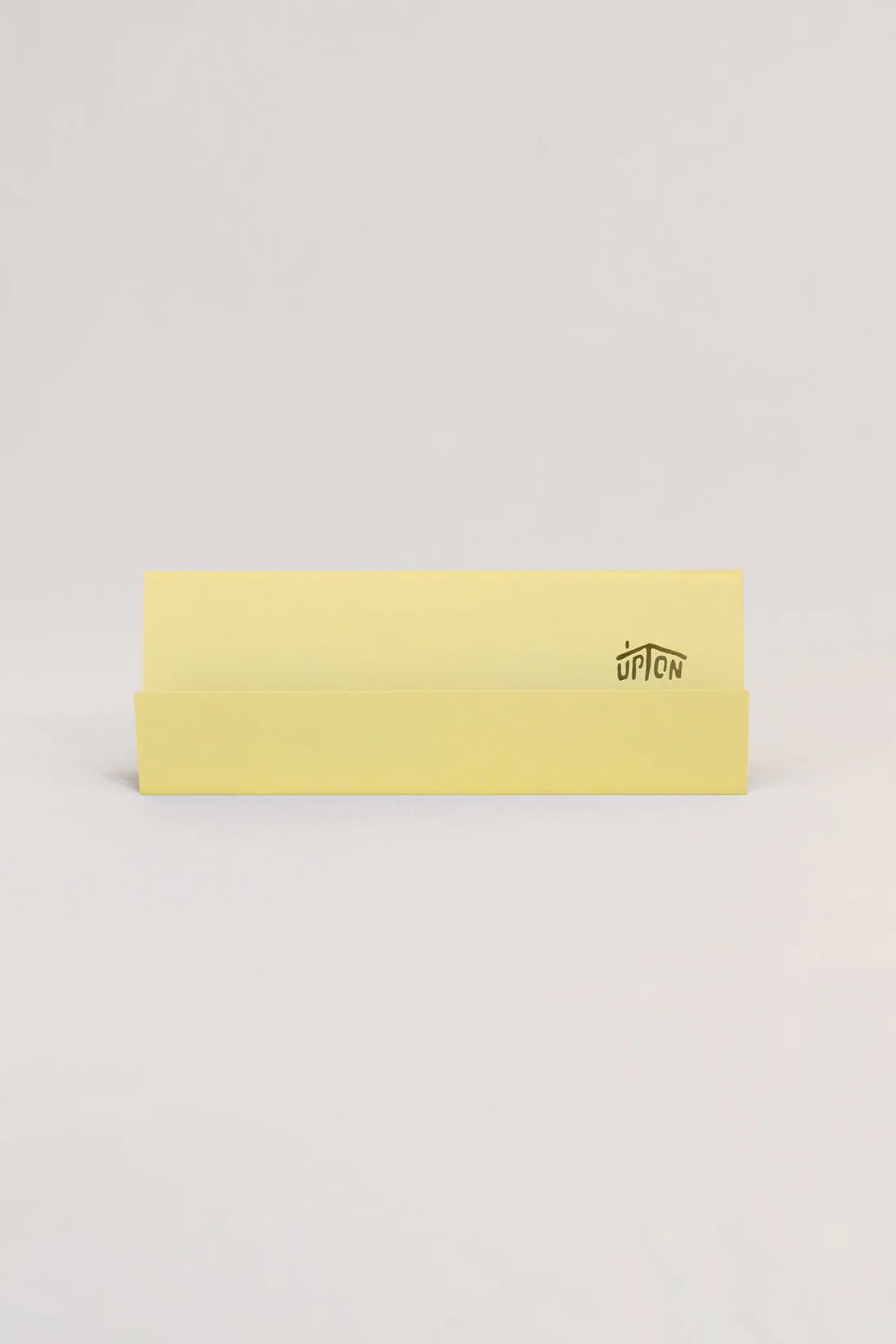 Now Playing Stand in Pale Yellow