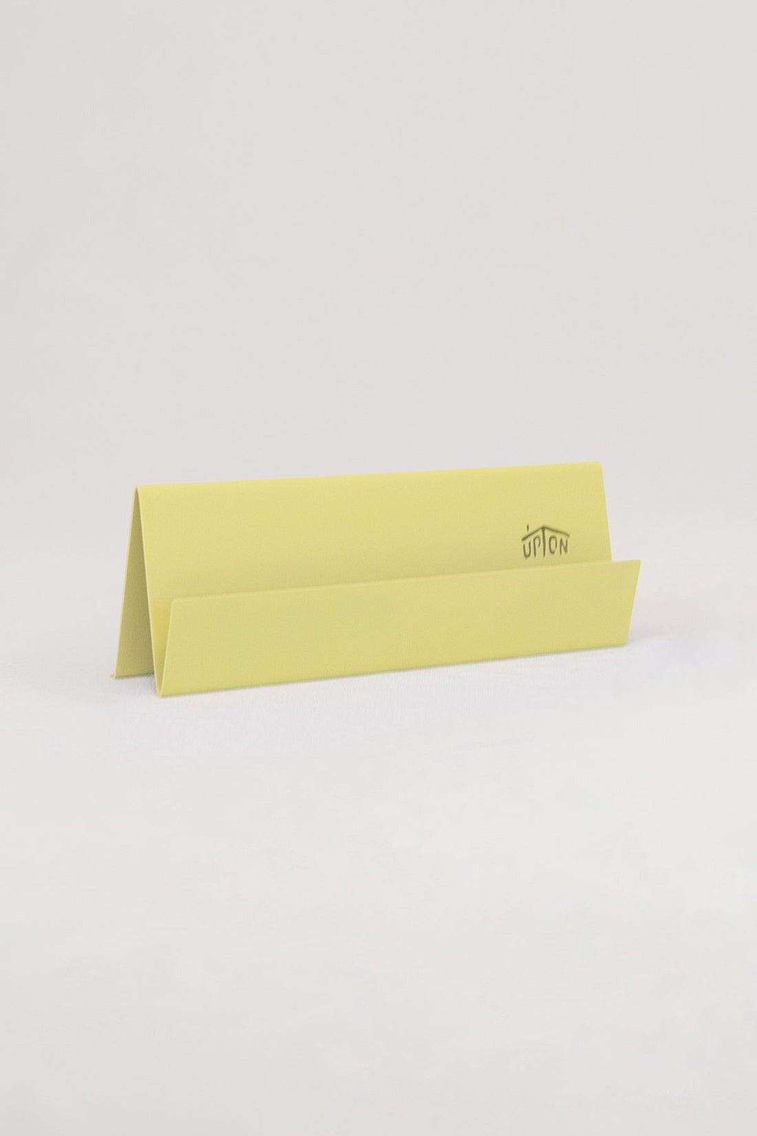 Now Playing Stand in Pale Yellow